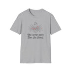 She Carries More Than She Shows botanical graphic tee for women