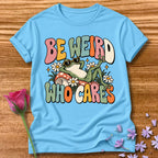 Be Weird Who Cares — Retro Groovy Frog T-Shirt for Women in Sky