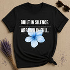 Built in Silence. Arrived in Full. — Plumeria Botanical T-Shirt for Women in Black