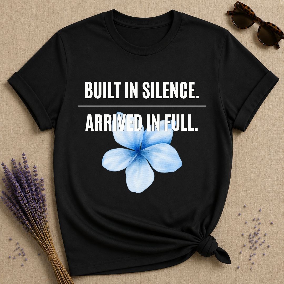 Built in Silence. Arrived in Full. — Plumeria Botanical T-Shirt for Women in Black
