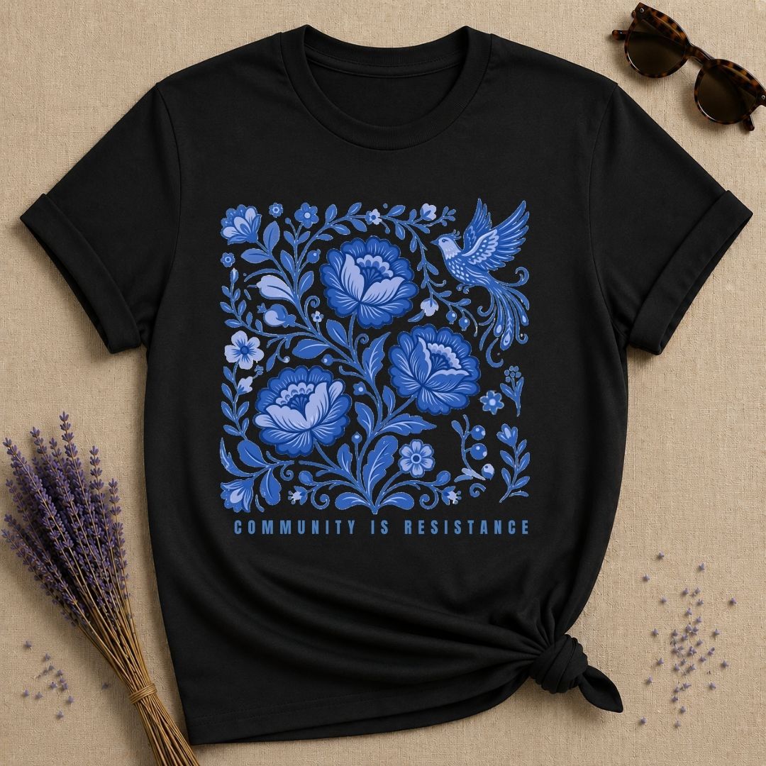 Community Is Resistance — Blue Floral Folk Art T-Shirt for Women in Black