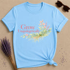 Grow Unapologetically — Watercolor Botanical Empowerment T-Shirt for Women in Sky