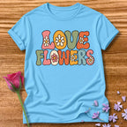 Love Flowers — Retro Groovy Daisy T-Shirt for Women in Sky