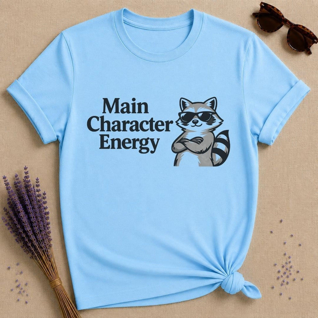 Main Character Energy — Vintage Raccoon Sticker Graphic T-Shirt for Women in Sky