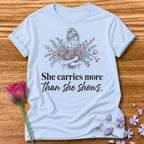 She Carries More Than She Shows — Floral Woman in Light Blue