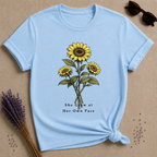 She Grew at Her Own Pace — Sunflower Self Growth T-Shirt for Women — Light Blue
