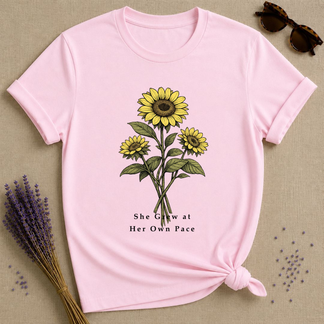 She Grew at Her Own Pace — Sunflower Self Growth T-Shirt for Women — Light Pink