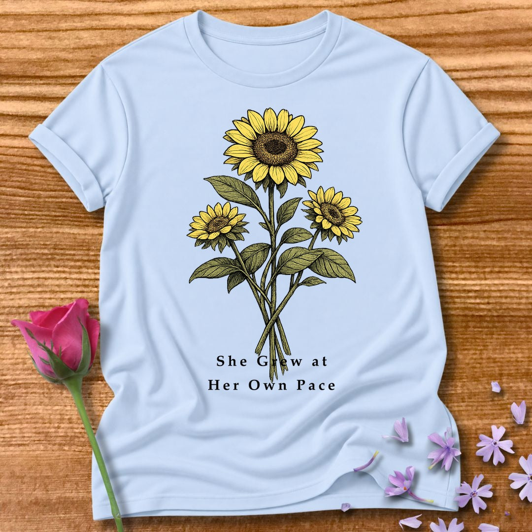 She Grew at Her Own Pace — Sunflower Self Growth in Light Blue