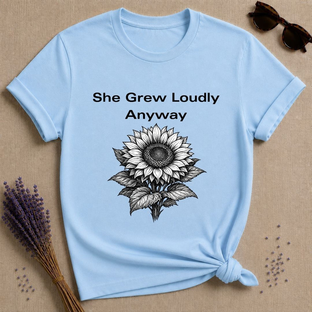 She Grew Loudly Anyway — Sunflower Botanical Graphic Tee for Women in Light Blue