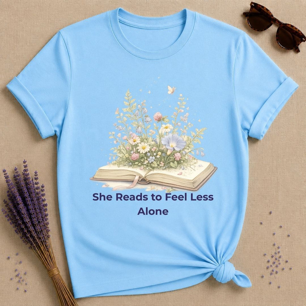 She Reads to Feel Less Alone — Open Book Garden T-Shirt for Women in Sky