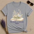 She Reads to Feel Less Alone — Open Book Garden T-Shirt for Women in Sport Grey