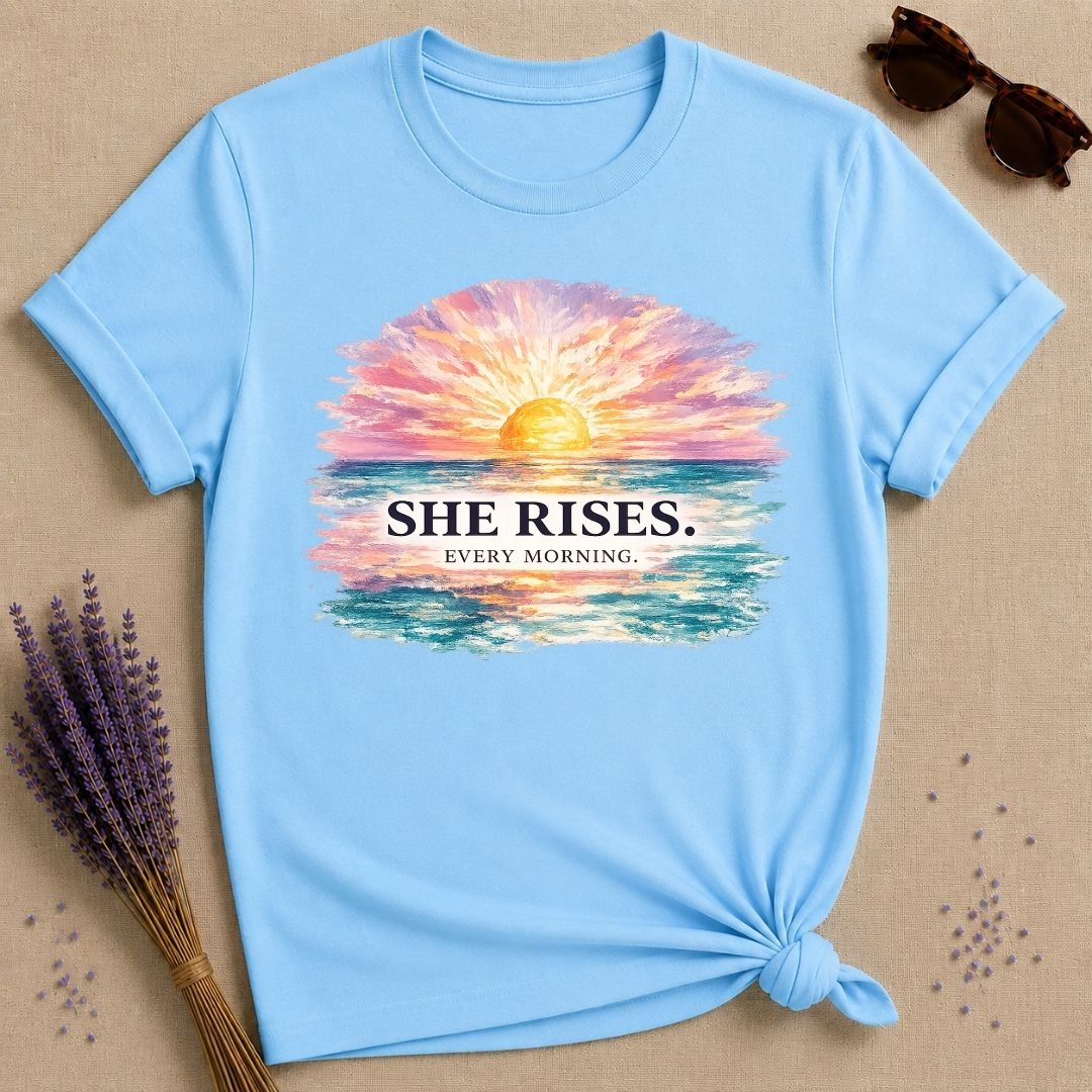 She Rises Every Morning — Watercolor Ocean Sunrise T-Shirt for Women in Sky