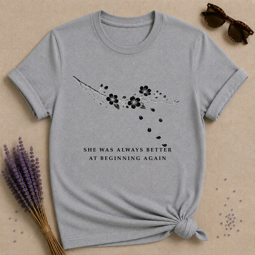 She Was Always Better at Beginning Again — Wildflower Resilience T-Shirt for Women — Sport Grey