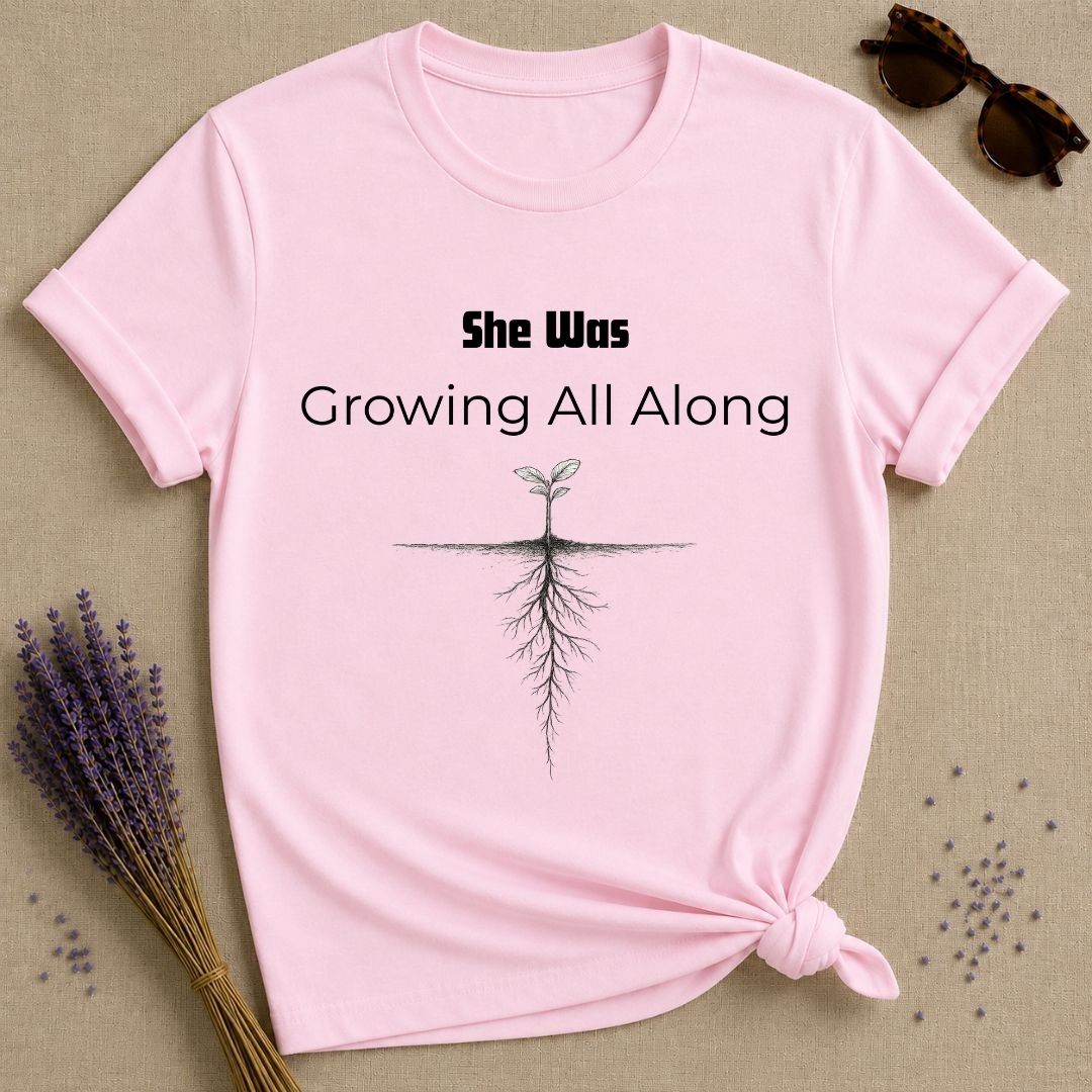 She Was Growing All Along — Seedling Roots Botanical T-Shirt for Women in Light Pink