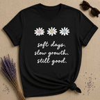 Soft Days. Slow Growth. Still Good. — Daisy Trio Botanical T-Shirt for Women in Black