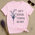 Soft Hands. Strong Heart. — Lily of the Valley T-Shirt for Women in Light Pink