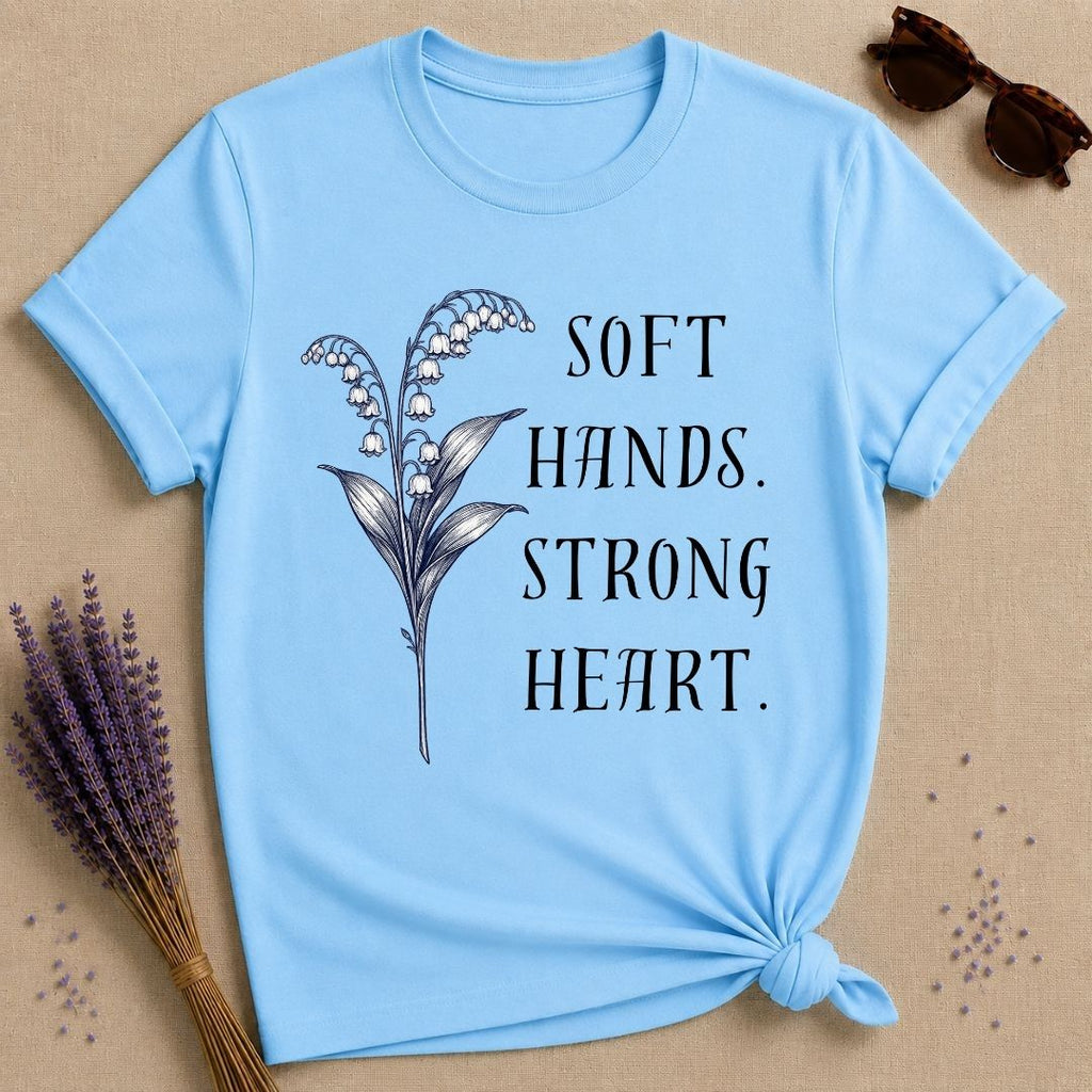 Soft Hands. Strong Heart. — Lily of the Valley T-Shirt for Women in Sky