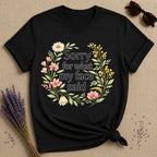 Sorry for What My Face Said — Wildflower Floral Humor T-Shirt for Women in Black