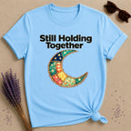 Still Holding Together — Patchwork Moon Botanical T-Shirt for Women in Sky